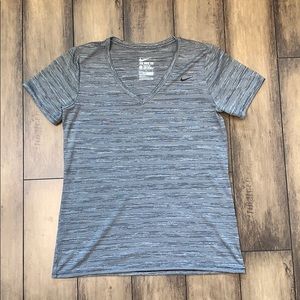 The NIKE Tee DRI-FIT Athletic Cut